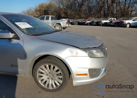 2011 Ford Fusion Hybrid from USA, damaged, VIN 3FADP0L32BR117459